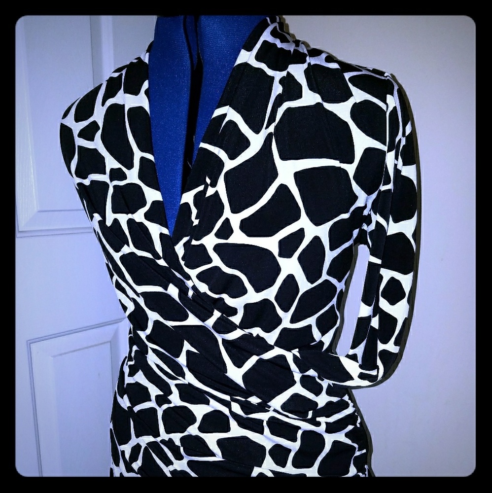 Chaus NY mock wrap animal print blouse.